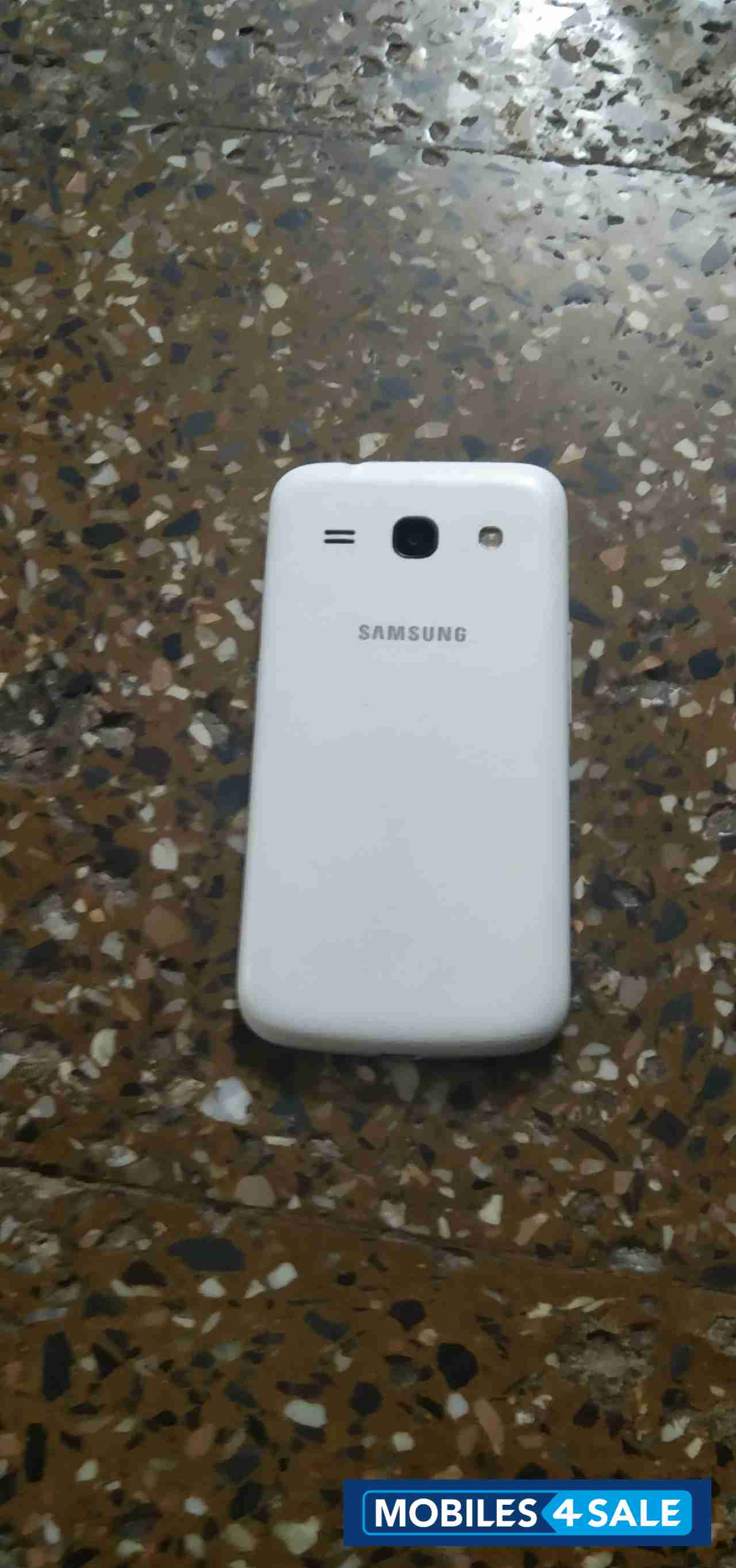 White Samsung  Galaxy star advance