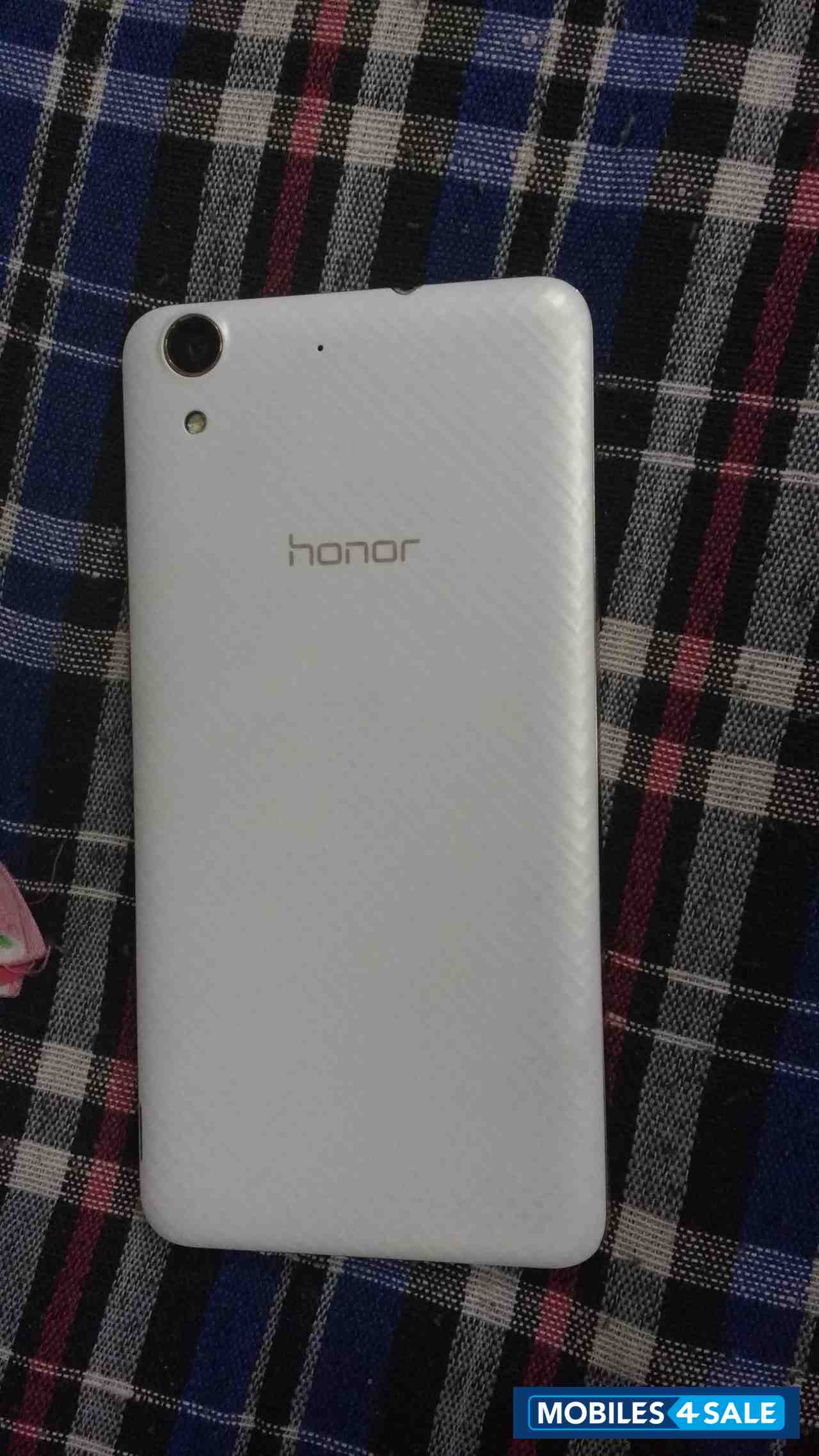 White Huawei Honor Holly 3