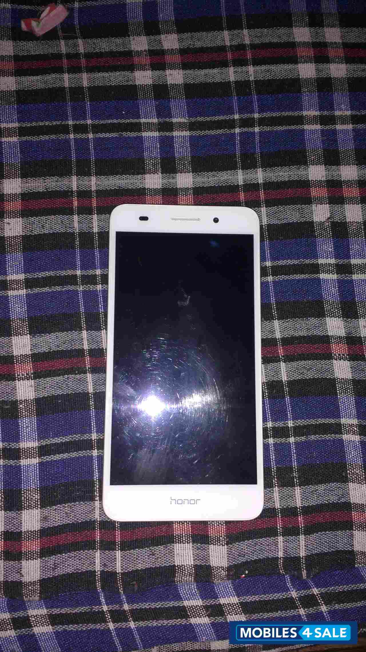 White Huawei Honor Holly 3