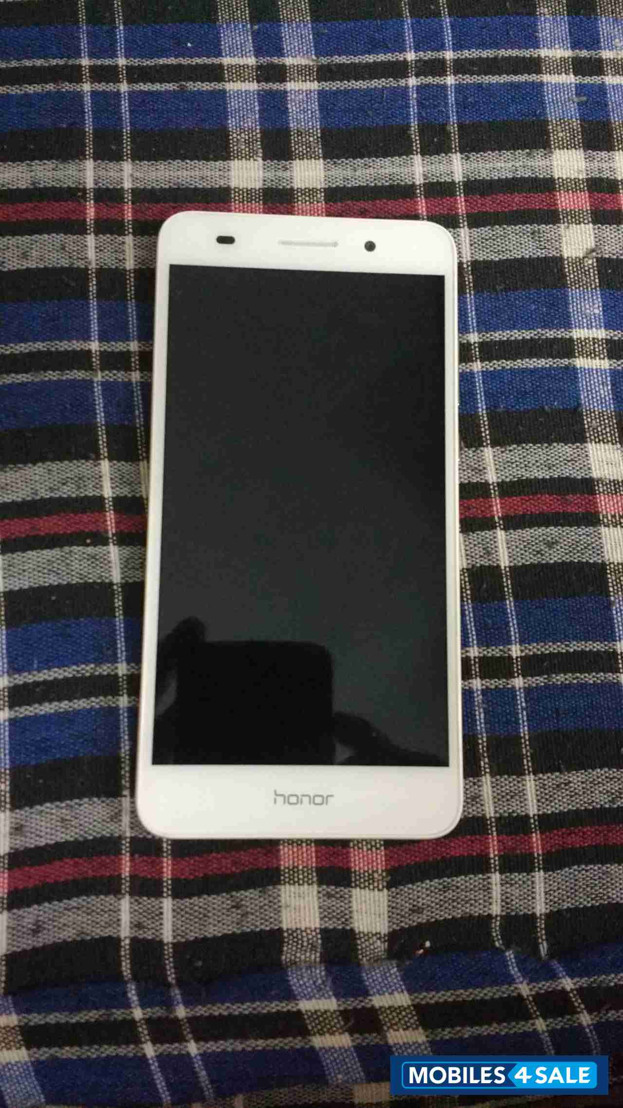 White Huawei Honor Holly 3