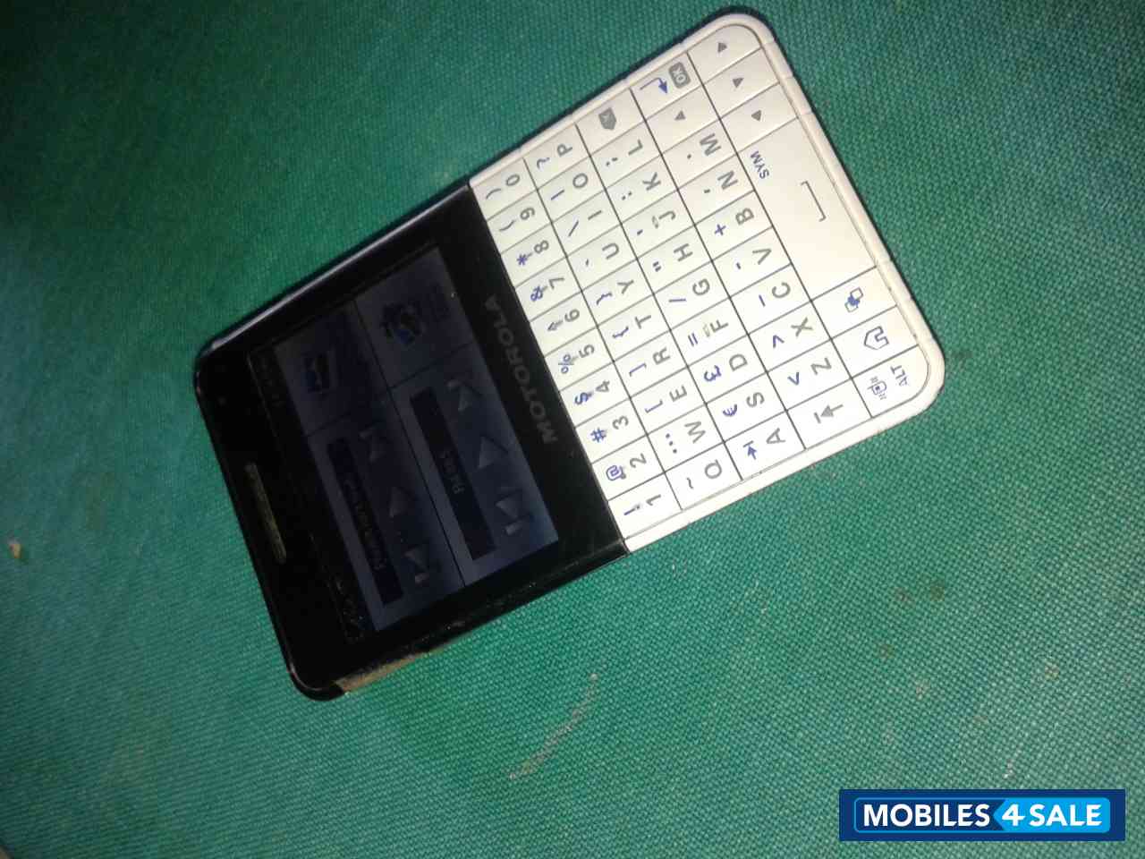 White & Black Motorola EX119