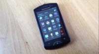 Black Sony Ericsson WT19i live with walkman