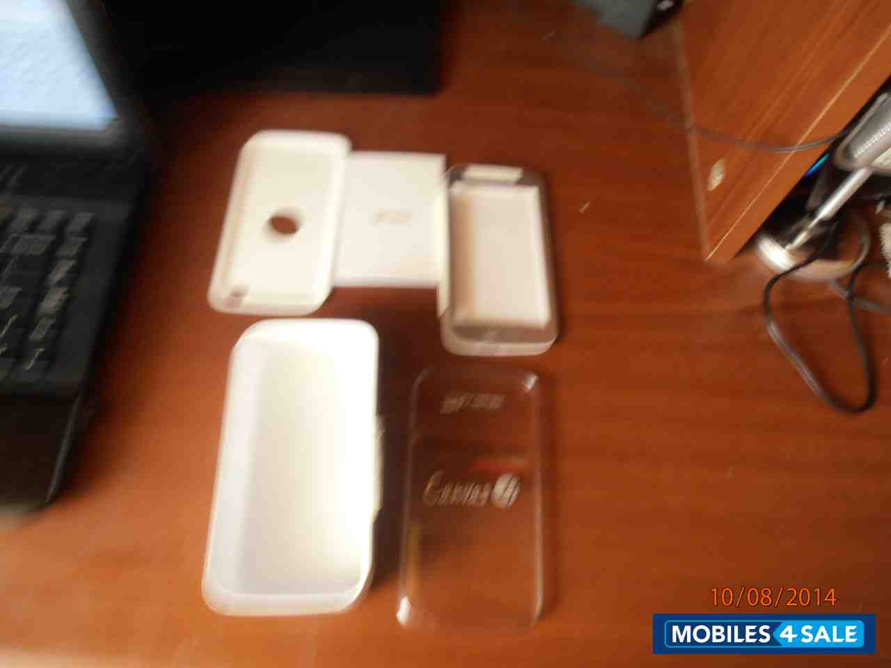 White Micromax Canvas 4 A210