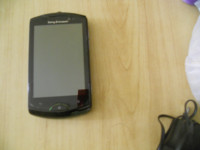 Black Sony Ericsson WT19i live with walkman